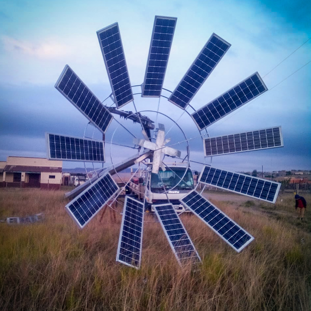 Solar masts set up in a rural South African community, emphasizing local infrastructure development.